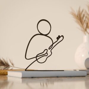 Black Ukulele Player Plastic Modern Line Art Figure Creative Musician Inspired Minimal Sculpture Home Office Display Accent Unique Instrument Decor Piece for Contemporary Interiors and Music Lovers