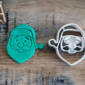 Santa Claus cookie cutter for Christmas baking shortbread cookies, sugar paste shaping, fondant cutting, cake decoration, pastry crafting, holiday treats, homemade festive desserts