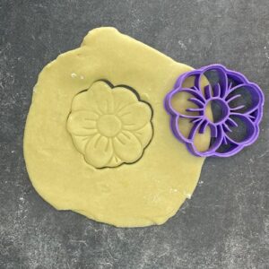 Flower shape cookie cutter for baking shortbread biscuits, fondant cutting, sugar paste shaping, floral themed pastry crafting, spring cake decoration, homemade dessert decorating tool