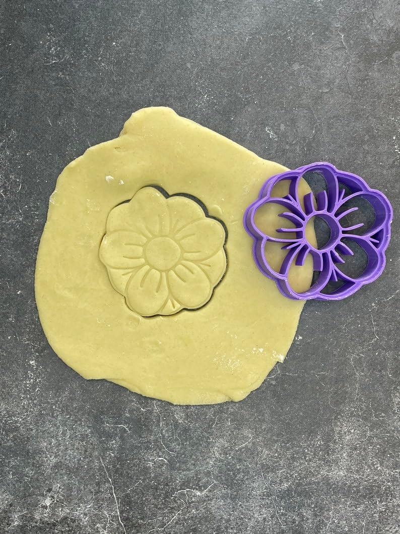 Flower shape cookie cutter for baking shortbread biscuits, fondant cutting, sugar paste shaping, floral themed pastry crafting, spring cake decoration, homemade dessert decorating tool