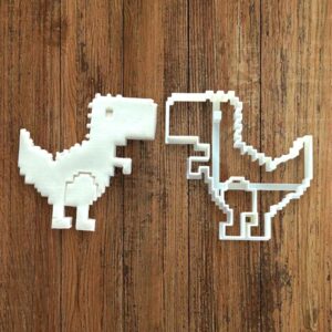 Dinosaur pixel art cookie cutter for baking shortbread biscuits, pixel dinosaur fondant cutting, sugar paste shaping, retro video game cake decoration, homemade pastry crafting tool