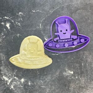 Flying saucer vehicle cookie cutter for baking shortbread biscuits, fondant cutting, sugar paste shaping, pastry crafting, space-themed cake decoration, homemade alien dessert making